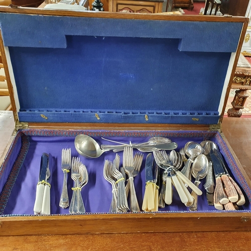 492 - A large 19th Century cutlery case along with a quantity of Flatware.