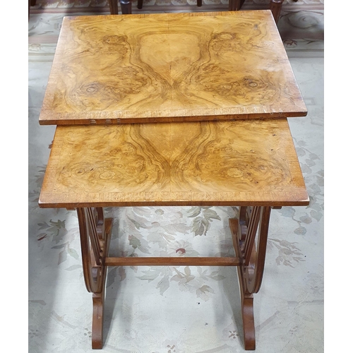 560 - A good Nest of two Walnut and Veneered Tables with lyre end. Largest being 44 x 33 x H 53 cm approx.