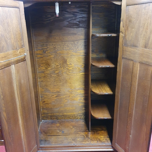 566 - A 20th Century Old Charm two door Linen Press with fitted interior. 95 x 48 x H 151 cm approx.