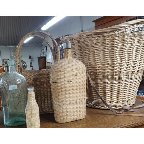 567 - A quantity of wicker Baskets along with other items.