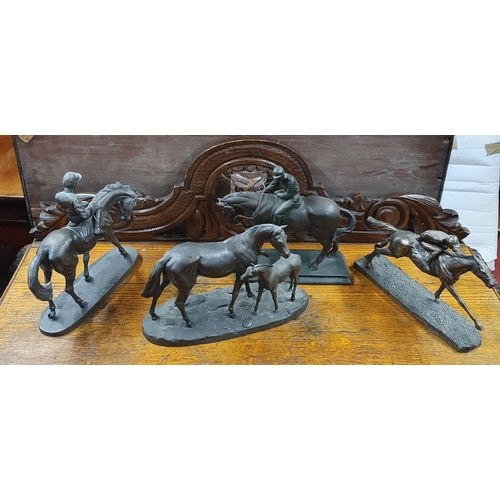 570 - A good group of Genesis Figures of Racehorses three with jockey up.