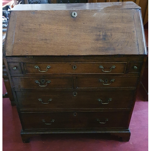 575 - A 19th Century Oak Bureau with fully fitted interior. W 93 x D 50 x H 109 cm approx.