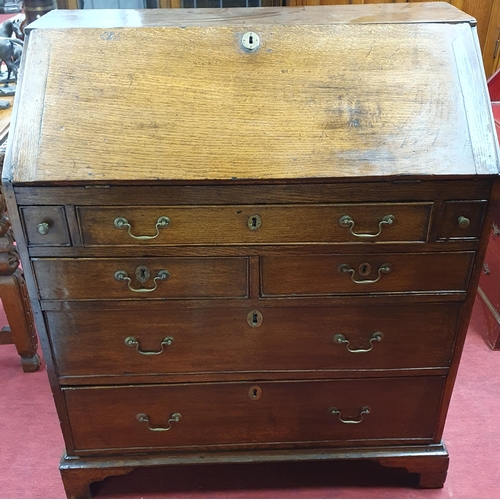 575 - A 19th Century Oak Bureau with fully fitted interior. W 93 x D 50 x H 109 cm approx.