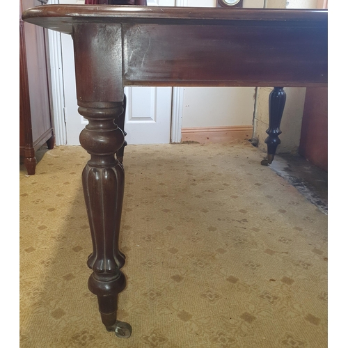 50 - A lovely early 19th Century Mahogany single leaf Dining Table on turned reeded and fluted supports a... 