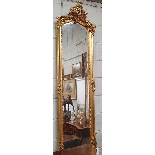 587 - A Timber and Plaster Gilt Pier Mirror with highly carved cartouche top and bevelled mirror glass.
17... 