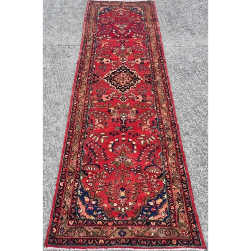 1098 - A fabulous rich Red ground handwoven Hamadan Iranian Runner with a traditional floral medallion desi... 