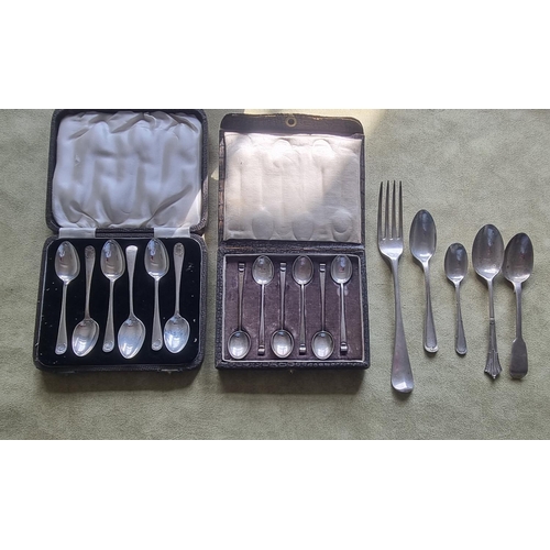 461 - A group of Silver Spoons to include a cased set and a matched set, 250 gms approx.