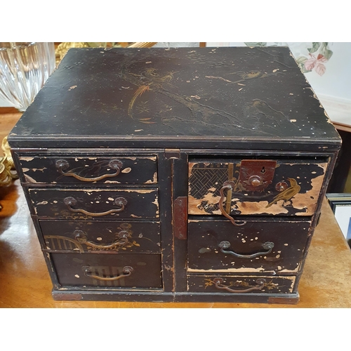 1091 - An Oriental Chest containing watch Parts.
H 27 x W 32 x D 23 cm approx.