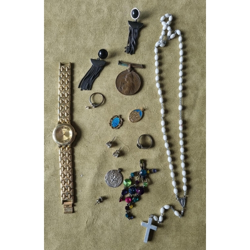 453C - A Turner Watch along with a Medal and a group of costume Jewellery.