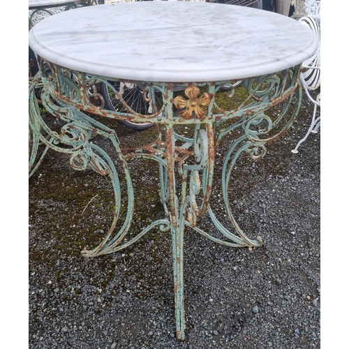 1103 - A really good Metal outdoor circular Table with a highly molded outline and Marble top.
Height 100 x... 