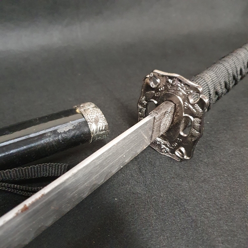 31 - A Good Metal Prop Sword .
Length 100 cm approx.