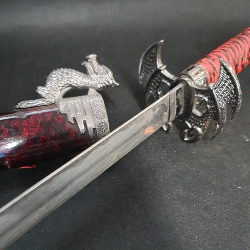 38 - A Good Metal Prop Sword .
Length 80 cm approx.