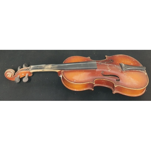 56 - A Child's Violin .
Length 55 cm approx.
