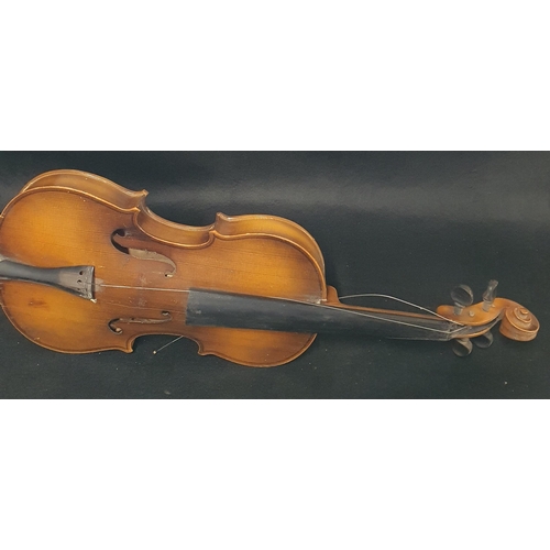 57 - A Child's Violin .
Length 58 cm approx.