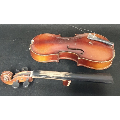 59 - A Child's Violin (damaged).
Length 52 cm approx.