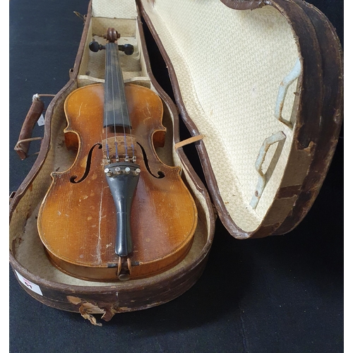 61 - A 19th Century Violin and Case.
Length 74 cm approx.