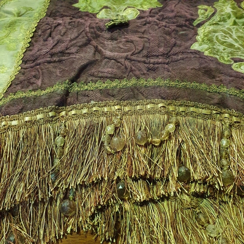 77 - A very ornate Green Ground Horse Blanket.
L 145 X 170 cm approx.