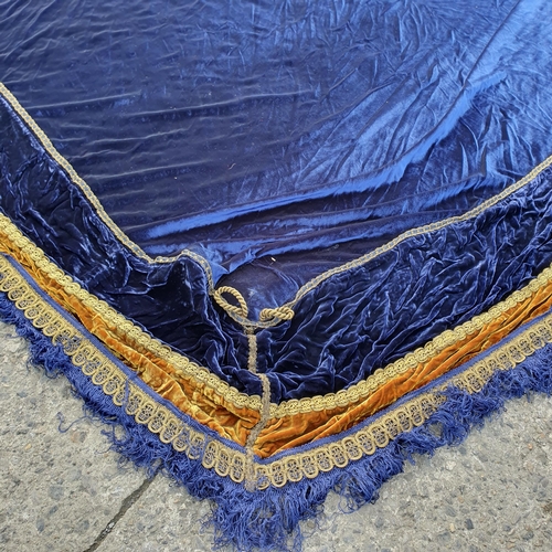 106 - An Extremely Large Sapphire Blue and Gold Trimmer Canopy.
10 Metres x 5 Mtr approx.