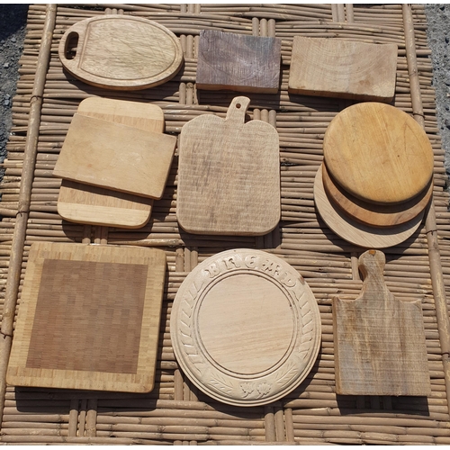 258 - A Vintage Picnic Basket along withy a  quantity of Wooden Chopping Boards.