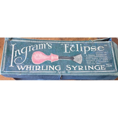 601A - A Vintage Ingram's ''Eclipse'' whirling Syringe,  (fully sterilized) in its original box.