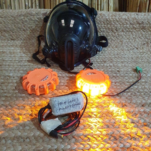 371 - A Moonhaven Gas Mask and 2 Orange Disc lights.