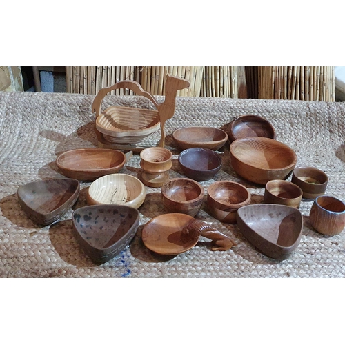 381 - A large quantity of Carved and Turned Wooden Bowls of various sizes.