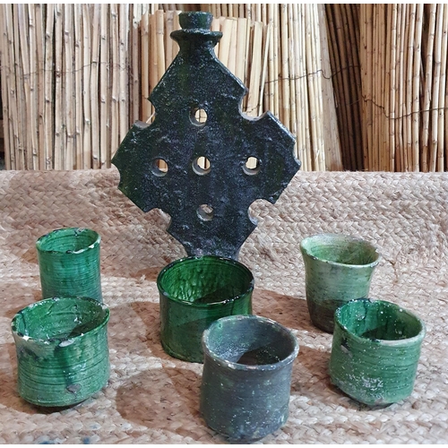 387 - A large Glazed Pottery Vase along with 3 tall candle holders and a group of Beakers. Tallest item 50... 