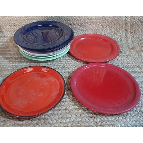 394 - A large selection of colourful Plates and Bowls.