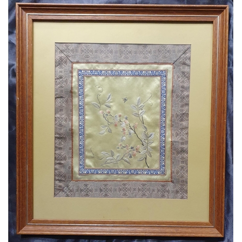 12 - A good Oriental Silk Panel depicting flowers and butterflies. 32 x 28 cm approx.