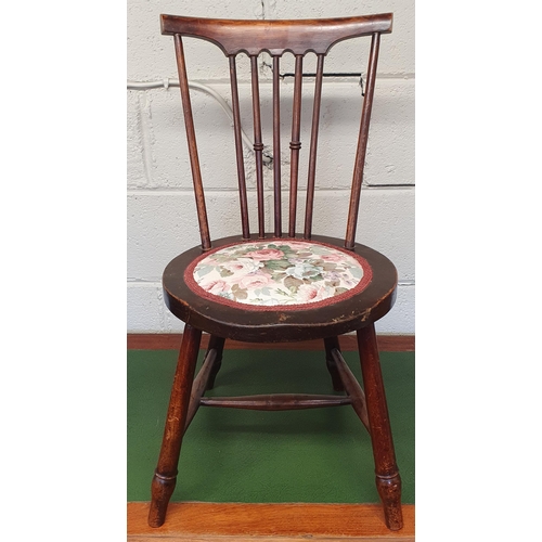 34 - An early 20th Century spindle back spinning Chair on turned supports and stretcher base. W 35 x SH 3... 
