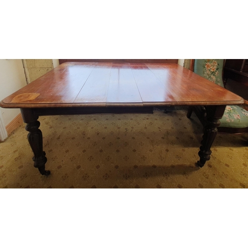 50 - A lovely early 19th Century Mahogany single leaf Dining Table on turned reeded and fluted supports a... 