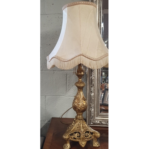 80 - A really good pair of Brass Table Lamps with classical decoration and cream shades. H 62 cm approx.