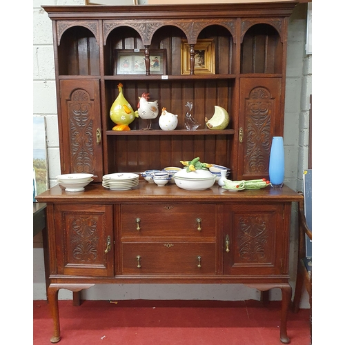 89 - A really good late 19th Century Oak Dresser with highly carved panel doors. W 151 x D 54 x H 203 cm ... 