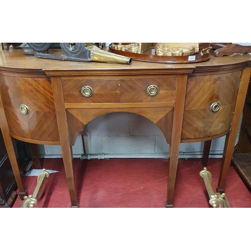 109 - A good late 19th early 20th Century bow fronted Sideboard with square tapered supports. W 145 x 60 x... 