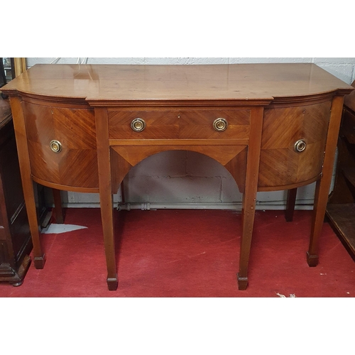 109 - A good late 19th early 20th Century bow fronted Sideboard with square tapered supports. W 145 x 60 x... 