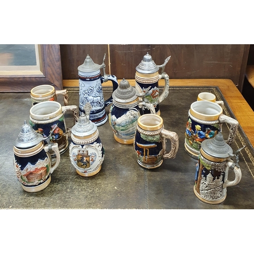 166 - A quantity of vintage Steins some with lids.