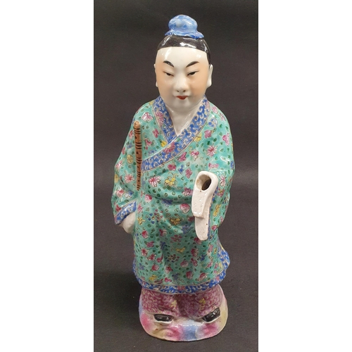 186 - A good early Oriental Figure of a Man with hand painted decoration. H 33 cm approx.