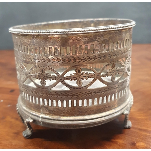 189 - A pair of Silver Plated Coasters with timber bases along with a highly pierced silver plated bottle ... 