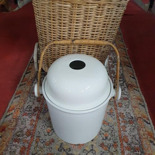 193 - A Lloyd Loom Linen Basket along with an unusual vintage 19th Century wicker trolley and a ceramic po... 