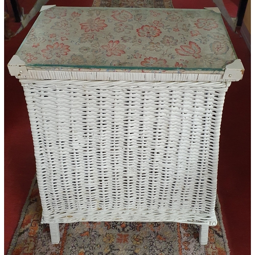 193 - A Lloyd Loom Linen Basket along with an unusual vintage 19th Century wicker trolley and a ceramic po... 