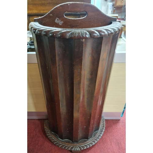 200A - A late 19th Century Mahogany stick Stand with rope edge top detail.