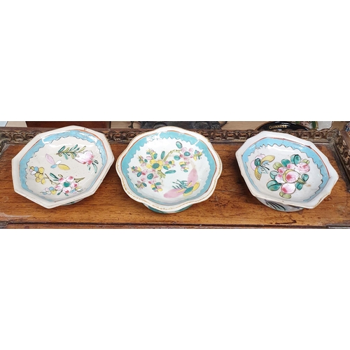 216 - An early Oriental Dish with hand painted decoration of flowers and butterflies along with three othe... 