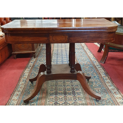 235 - A really good Regency Mahogany foldover Card Table with quatrefoil splayed platform base, with venee... 