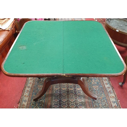 235 - A really good Regency Mahogany foldover Card Table with quatrefoil splayed platform base, with venee... 