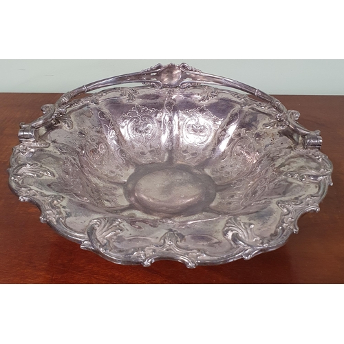 243 - A fine early 20th Century Silver Plated Centrepiece along with a centre dish. D 30 cm approx.