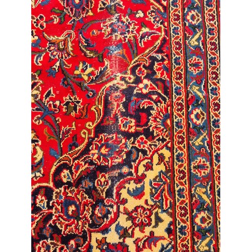 1043 - A fabulous rich Red ground Iranian Red ground Carpet Carpet with a trditional medallion design from ... 