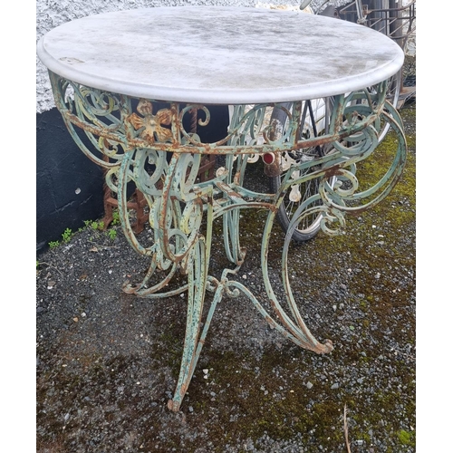 1104 - A really good Metal outdoor circular Table with a highly molded outline and Marble top.
Height 100 x... 