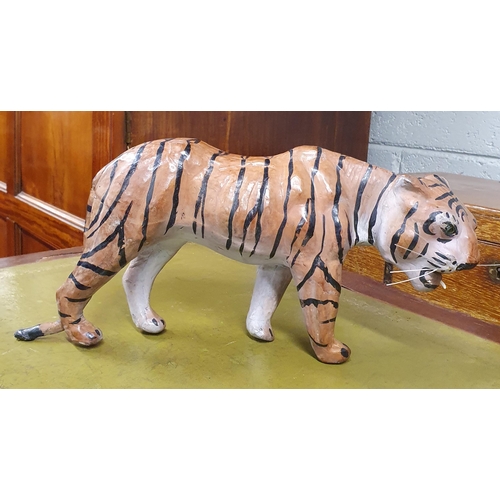 10 - A good Leather Figure of a Tiger.
H 16 x L 340 cm approx.