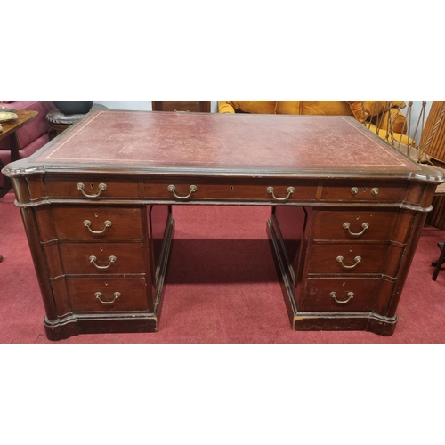 1445 - An Early 20th Century Mahogany Pedestal Writing Desk with Burgundy Tooled Leather Top.