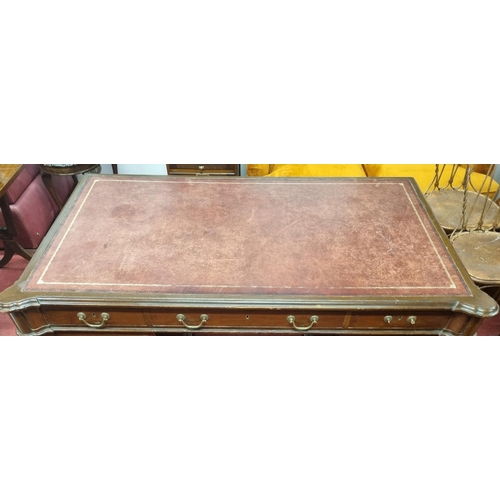 1445 - An Early 20th Century Mahogany Pedestal Writing Desk with Burgundy Tooled Leather Top.